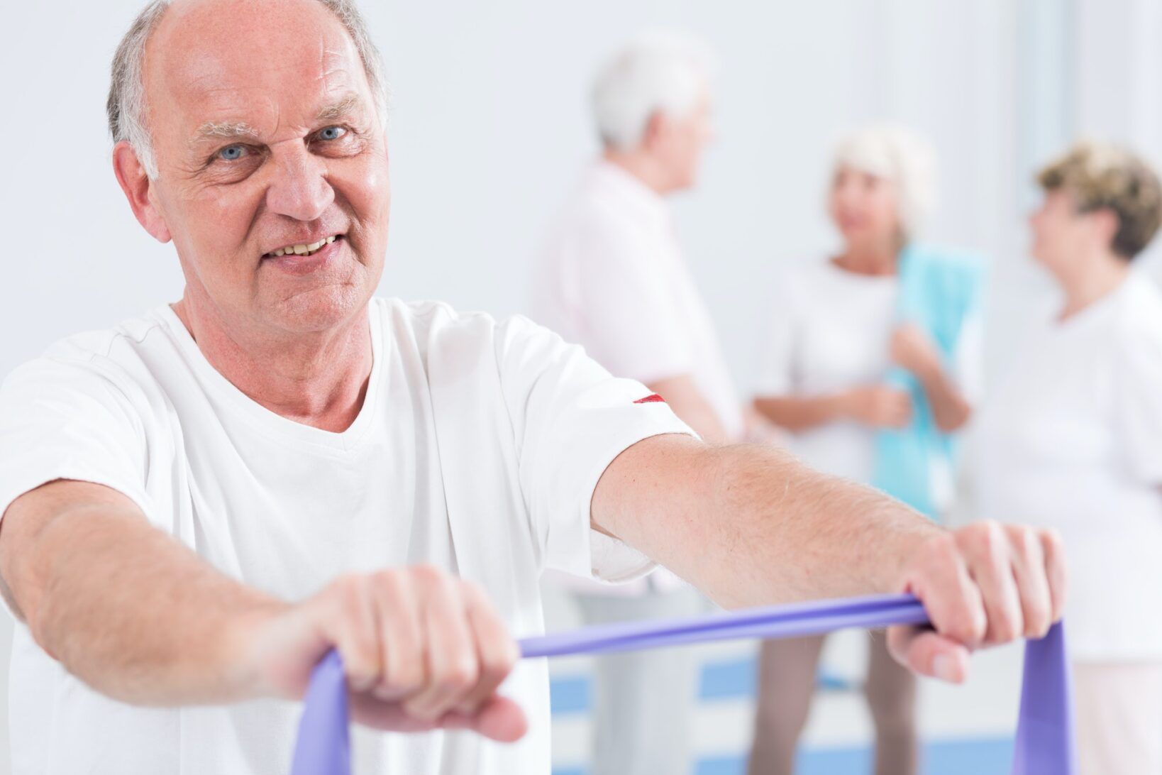 Man exercising with exercise band